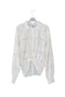 Camicia bianca in cotone con ricamo traforato e nodo frontale