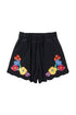 Shorts in bull con fiori multicolor neri