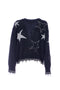 Maglia over nera con stelle e frange