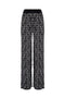 Pantalone “Yokim” nero in maglia jaquard con stampa logomania