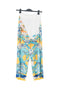 Pantalon palazzo blanc avec imprimé all over