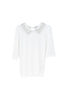 Polo aderente crema in maglia con strass