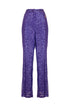 Pantaloni ampi viola modello a palazzo in tessuto paillettes