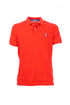 Orange polo shirt in cotton piqué with logo embroidered on the chest